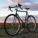 The “before” of this bike, with the “narrow” 35c tires front and rear. Note that there is now a very funky Crust stem as opposed to the older, more standard Nitto Technomic stem on it before. It makes the bike’s “reach” shorter and the riding position more upright and comfy.